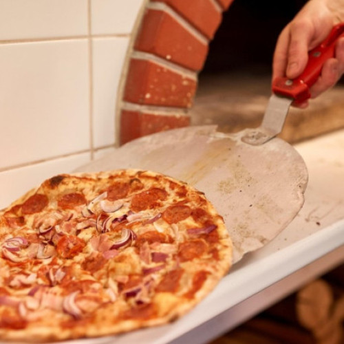 Scandal în Italia: un restaurant cere bani în plus ca să nu pună un ingredient în pizza. „E de-a dreptul trist şi ruşinos”